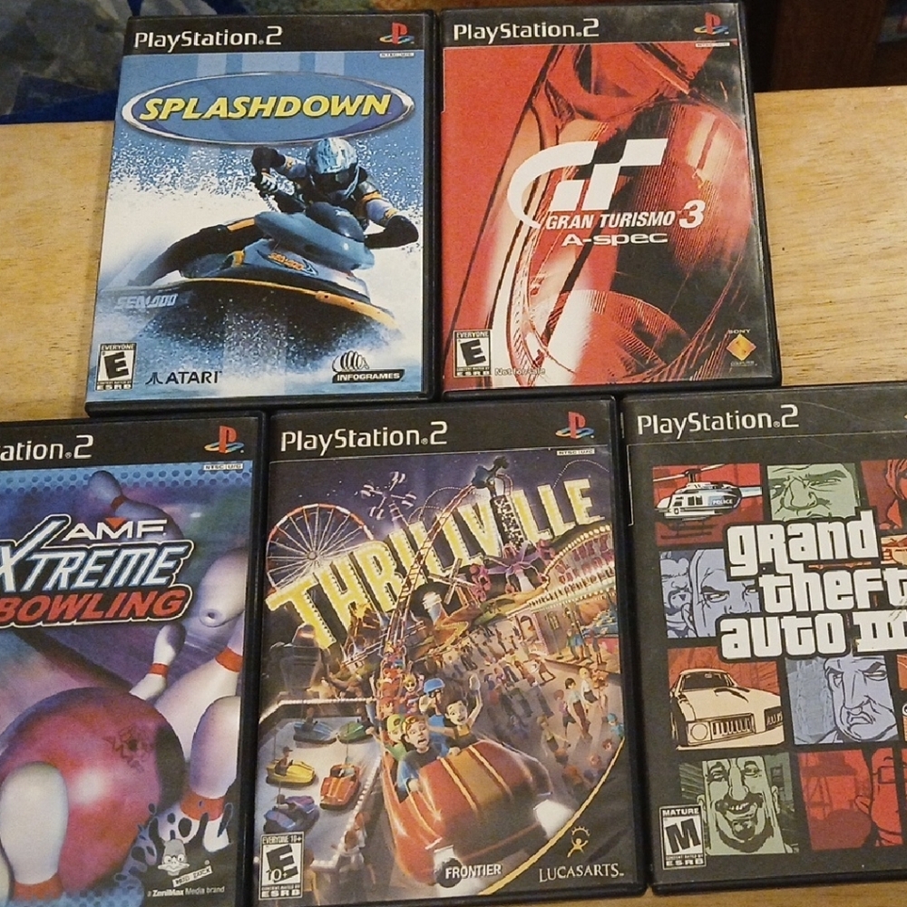 Sony PlayStation 2 Game Set - Black Cases